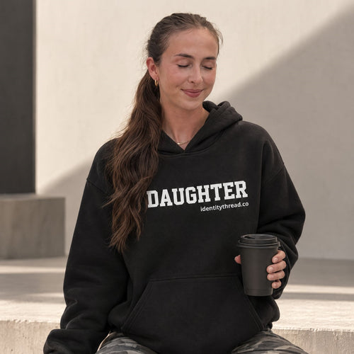 Woman enjoying coffee with her daughter of God Christian hoodie on