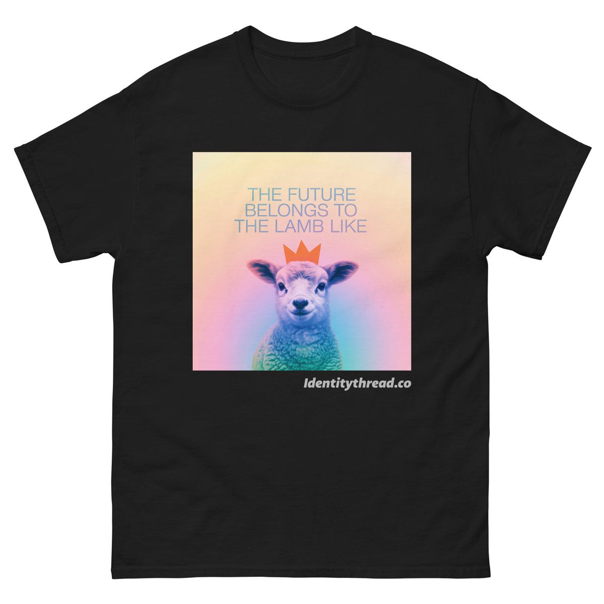 A black short-sleeve Christian t-shirt with a square graphic print on the chest. The graphic features a pastel gradient background with a central image of a lamb wearing a small orange crown, accompanied by the text 'THE FUTURE BELONGS TO THE LAMB LIKE' in light blue and 'identitythread.co'.