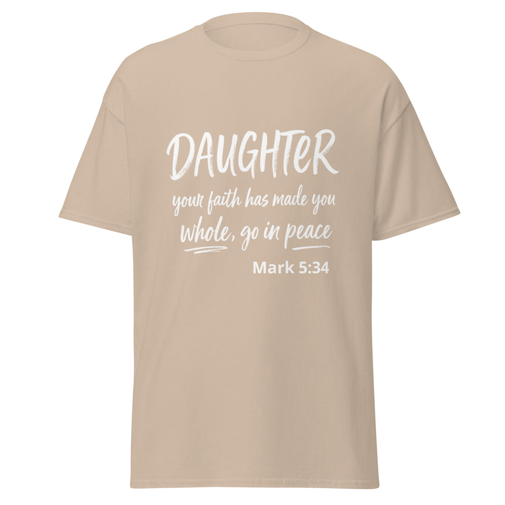 A beige short-sleeve t-shirt with a white printed Bible verse on the front reading 'DAUGHTER your faith has made you whole, go in peace Mark 5:34'.