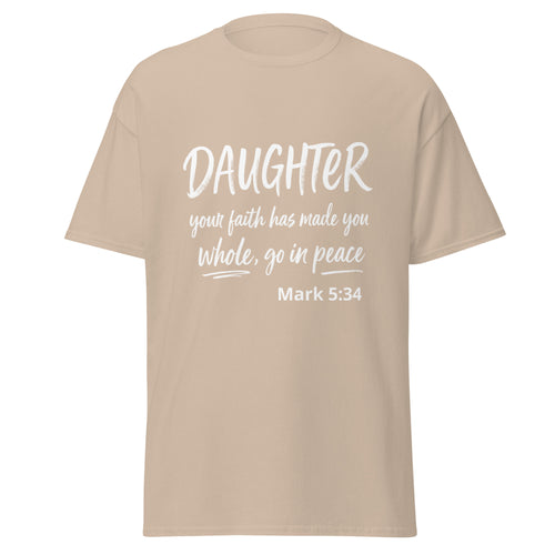 A beige short-sleeve t-shirt with a white printed Bible verse on the front reading 'DAUGHTER your faith has made you whole, go in peace Mark 5:34'.