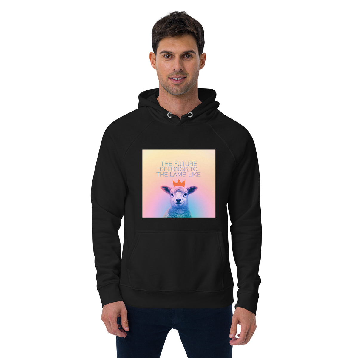A man wearing a black pullover Christian hoodie with a colorful graphic print on the chest. The graphic features a stylized sheep with a small orange crown and the text 'THE FUTURE BELONGS TO THE LAND LAMB' in light blue.