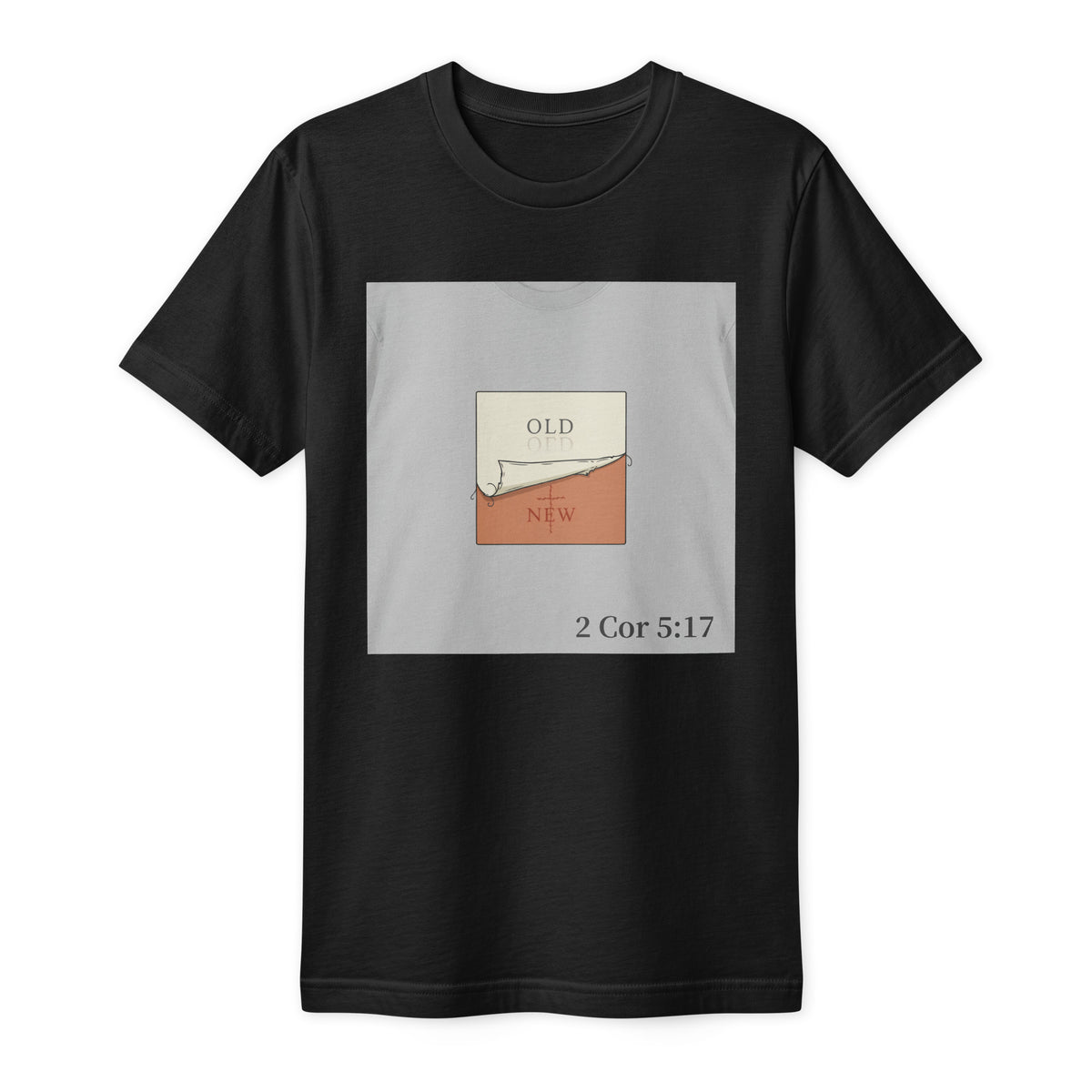 A black short-sleeve crewneck Christian t-shirt with a centered square graphic print. The graphic features a light gray background with a small illustration of a torn page showing 'OLD' in cream and 'NEW' in terracotta, plus the text '2 Cor 5:17' below.