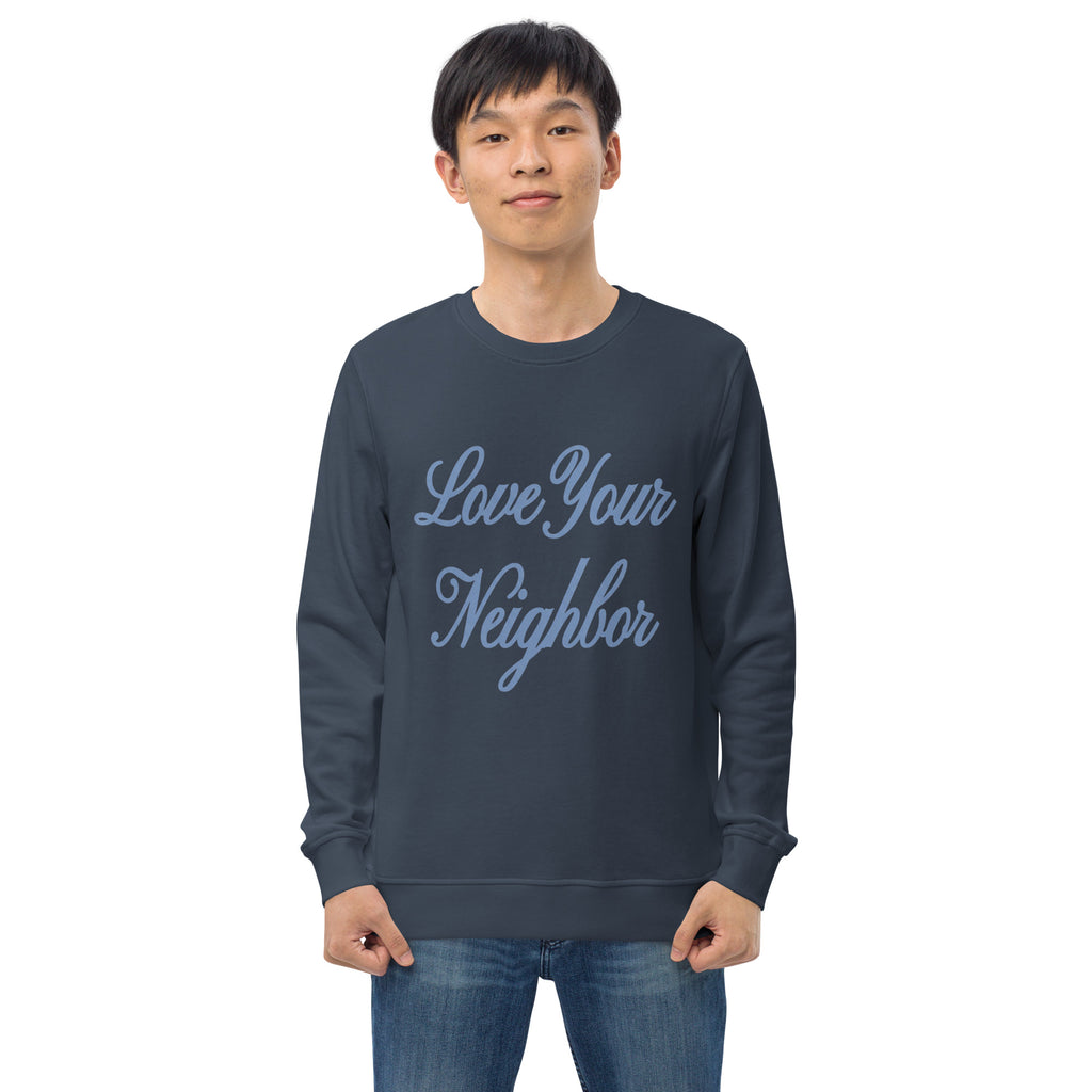 Man wearing a "Love Your Neighbor" unisex organic Christian sweatshirt in French Navy, front view