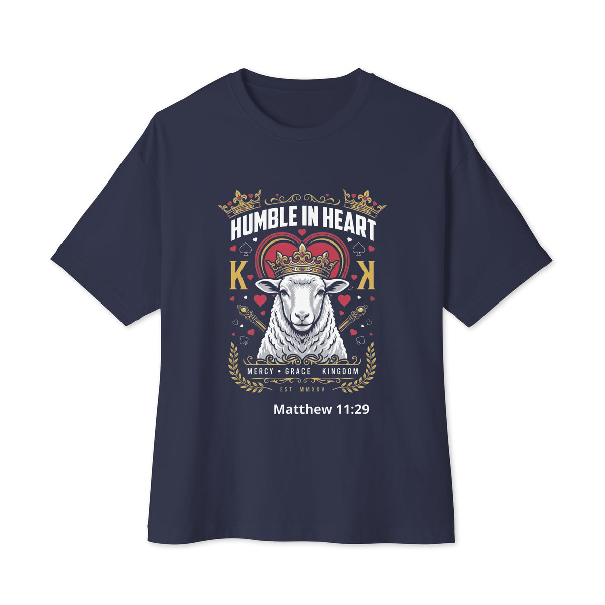 A navy blue short-sleeve Christian t-shirt with a detailed graphic on the front featuring a white sheep wearing a gold crown, flanked by two gold lions and a red heart, with the text 'HUMBLE IN HEART', 'KING', 'MERCY SHEEP KINGDOM', and 'Matthew 11:29'.