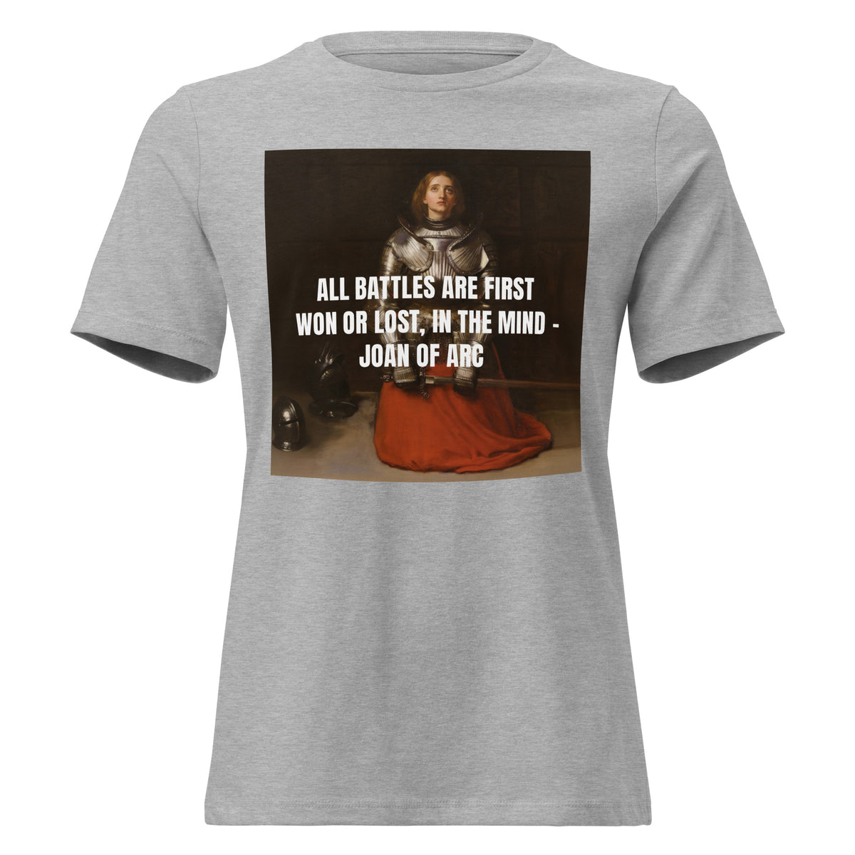 Gray Christian T shirt featuring Joan of Arc artist depiction holding a sword kneeling with the quote in white "All battles are first won or lost, in the mind - Joan of Arc"